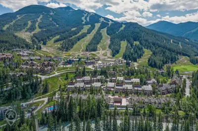 an aerial view of a resort in the mountains at Toby Creek Lodge by StayIn in Panorama