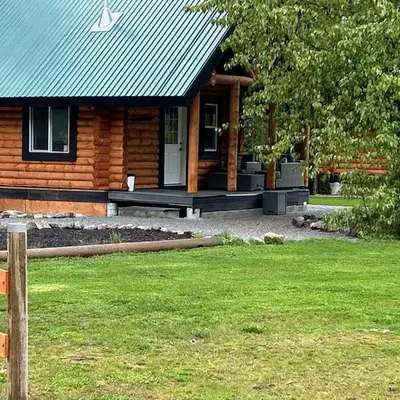Log lofted rustic cabin in woods