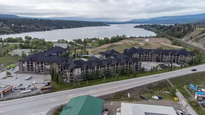 an aerial view of a resort with a lake at Aspen Retreat in Invermere