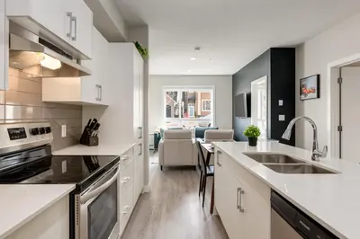a kitchen with a sink and a counter top at Free Parking, Close to Downtown, Pet Friendly in Calgary
