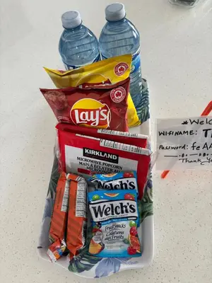 a pile of snacks and a bottle of water at Luxury family vacation rental in Laurel Edmonton in Edmonton