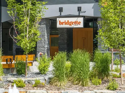 a building with a sign that reads diabetes at Modern Mountain Oasis Top floor 2 level 2bd in Canmore