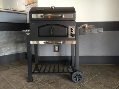 a stove on a cart in a kitchen at Home Away Inn in Drayton Valley