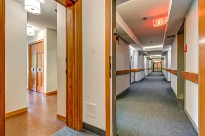 an empty hallway in an office building at Greystone Lodge 224 Ski-in Out in Whistler