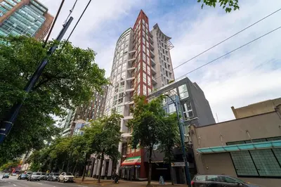 a tall building on the side of a city street at The Urban Lofts in Vancouver