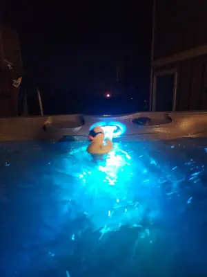 a rubber duck in a swimming pool at night at Cozy Quiet Suite with Private Hot Tub with Ocean Views in Nanaimo