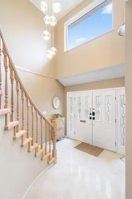 a skylight in a home with a hallway with stairs at Spacious Family Retreat Central to YVR and Downtown in Vancouver