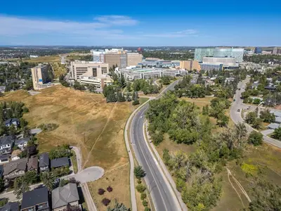 an aerial view of a city with a road at 5 bed Luxury Home Steps to DT, River and Hospital in Calgary