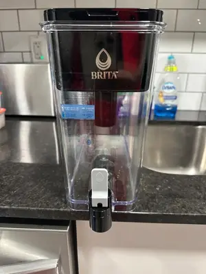 a blender sitting on top of a kitchen counter at Newly Built 2-Bedroom, 2 full bath Basement Suite in Calgary