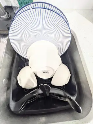 a whisk sitting on top of a sink at Glacier Ridge 1 bedroom haven in Calgary