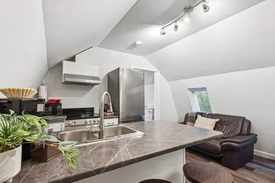 a kitchen with a sink and a stove at Quiet and rural apartment in the country in Cobble Hill