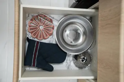 a drawer with a pot and a plate in it at Modern & Cozy Home in the Heart of Downtown Vancouver in Vancouver