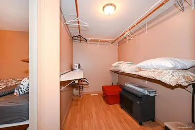 a room with two bunk beds and a desk at Fort Wine Burrow, Entire Private Estate Home in Maple Ridge District Municipality