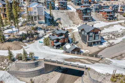 a model of a city with a bridge and houses at Snow Therapy Chalet - Ski In Out, Hot Tub & Mtn View in Big White