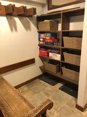 a room with a book shelf with books at Best Location Available in Whistler Village in Whistler