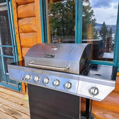 a grill sitting on top of a stove in front of a window at Eagle Nest by StayIn in Fairmont Hot Springs