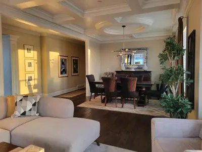 a living room with a couch and a table at Sand and Salt Bed & Breakfast in White Rock