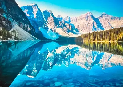 a view of a mountain lake with its reflection at Edith Gate Luxe Bedroom 2 Homestay in Calgary