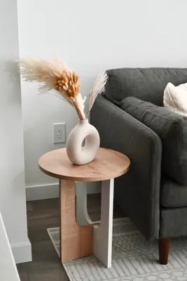 a vase on a table next to a couch at Stylish 2-Bedroom Condo - Premium Comfort, Central Location in Surrey