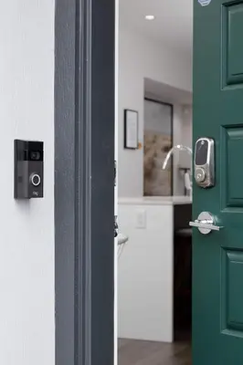 a door to a bathroom with a sink and a counter at Luxury home near DT and YVR w 2 indoor parking in Vancouver