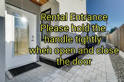 an internal entrance place hold the handle tightly when open and close the door at D Peaceful Suite in West Vancouver