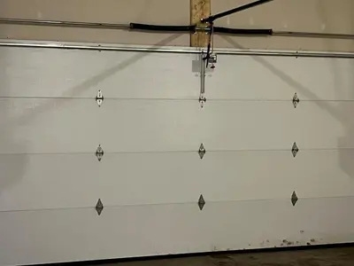 a white wall with silver triangles on it at Elegant 3BD Home in Beaumont, Double Garage in Nisku