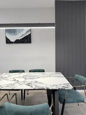 a dining room with a table and chairs at Memory Lodge in Canmore