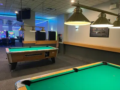 a billiard room with a pool table in it at The Lodge Inn in Edmonton
