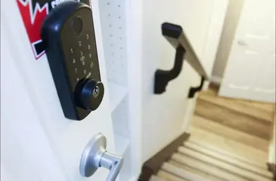 a close up of a door with a handle at Cozy 2BR Private Basement Suite, Free Parking, WiFi, 1 Hr to Banff, 20 Min to City in Calgary