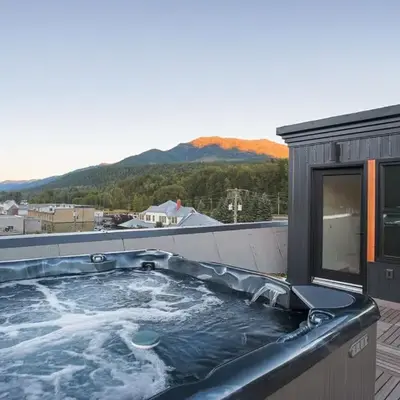 Downtown Loft with Rooftop Hot Tub by StayIn