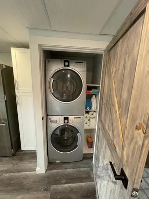 a washer and dryer in a small room at Passage view in Campbell River