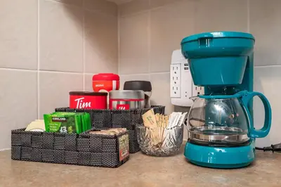 a blue blender sitting on top of a kitchen counter at Rocky Mountain Oasis-Mountain View! in Canmore