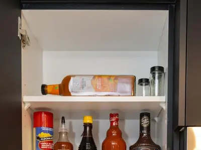 a refrigerator filled with lots of different types of alcohol at GoodVibes in Calgary