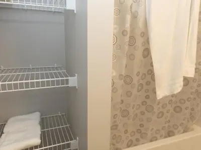 a bathroom with a shower and a shower curtain at GoodVibes in Calgary