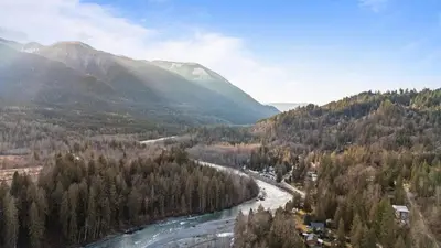 a view of a river in a valley with mountains at Casa del Rio - Peaceful River Guest Suite -Forests -Mountains -Hiking in Chilliwack