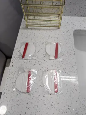 a counter with four plastic covers on a table at Chic 2BR Suite with Kitchen, Laundry, Near Elk Island & West Edmonton Mall in Edmonton