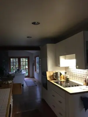 a kitchen with a sink and a stove top oven at West Vancouver 3 bedroom Spacious Very Well Maintained Close to Ocean Mts Hikes Golf Shopping City Whistler in West Vancouver