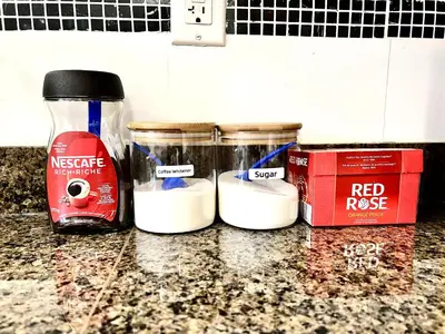 three jars of white ingredients sitting on a counter at Cozy 2-bedroom Private Guest House in a convenient location in Vancouver