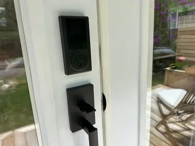 a security door with a speaker on it at Posada Nordica - a chic, tranquil mountainview suite in Hope