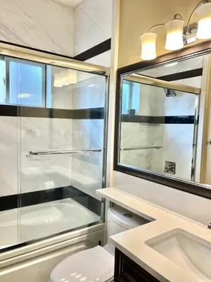 a bathroom with a shower and a sink at Central & Comfy 1B1B in Vancouver