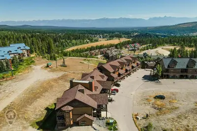 an aerial view of a resort with a group of buildings at Timberstone Lodge by StayIn in Kimberley