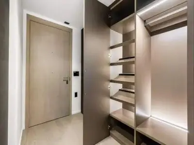 a hallway with a metal staircase and a door at Brand New Luxury 1 bedroom Condo in Downtown Vancouver in Vancouver