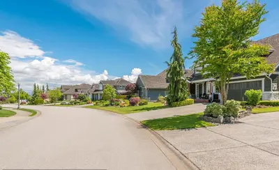 a street in a residential neighborhood with houses at The open nest in Delta