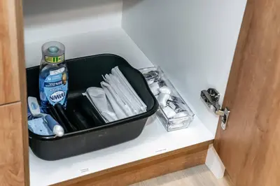 a black container sitting on a shelf in a room at ExoticLUSHquietRetreatKingBed|WIFI|Parking|WEM in Edmonton