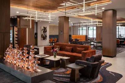 a lobby with a couch and chairs and tables at TownePlace Suites by Marriott Chilliwack in Chilliwack