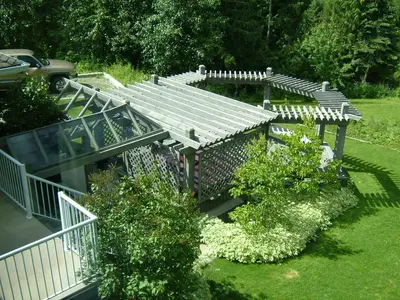 an overhead view of a wooden pergola in a garden at Silver Star Bed and Breakfast in Vernon