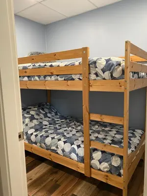 a bunk bed in a room with at Blind Bay Chalet 2 Bedroom Private Suite in Blind Bay