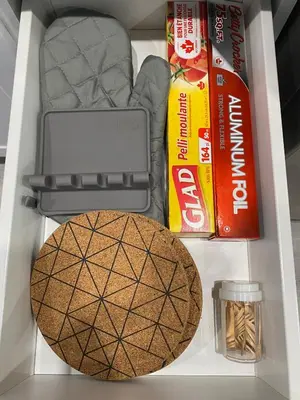 a drawer with a cookie and other items in it at Blind Bay Chalet 2 Bedroom Private Suite in Blind Bay