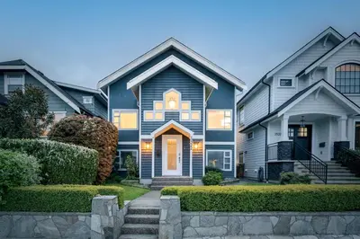 a house with a blue and white house at Family-Friendly 3BR Home in Vancouver