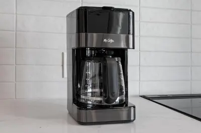 a coffee maker sitting on top of a counter at Brand new suite downtown Kelowna - walk everywhere! in Kelowna